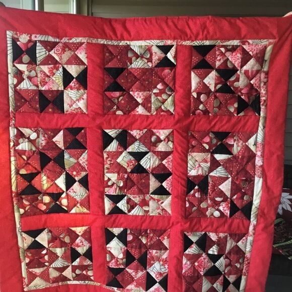 NWT Hand Crafted Red Black Gold and Tan Prints Quilt with Red Borders